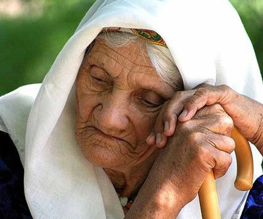 Volunteers spending time with senior citizens